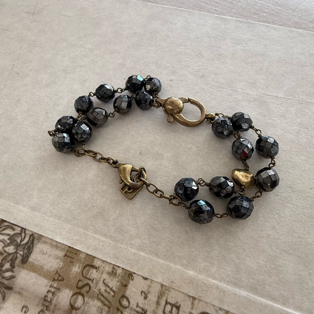 Waxing Poetic Black and Gold Bracelet